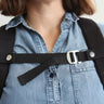 A detachable sternum strap that snaps onto both shoulder straps of The Rolltop. A g-hook metal clasp allows the strap to be adjusted in size. Stitching on the shoulder straps allows the sternum strap to sit at a fixed position on the shoulder straps and wearer's body.